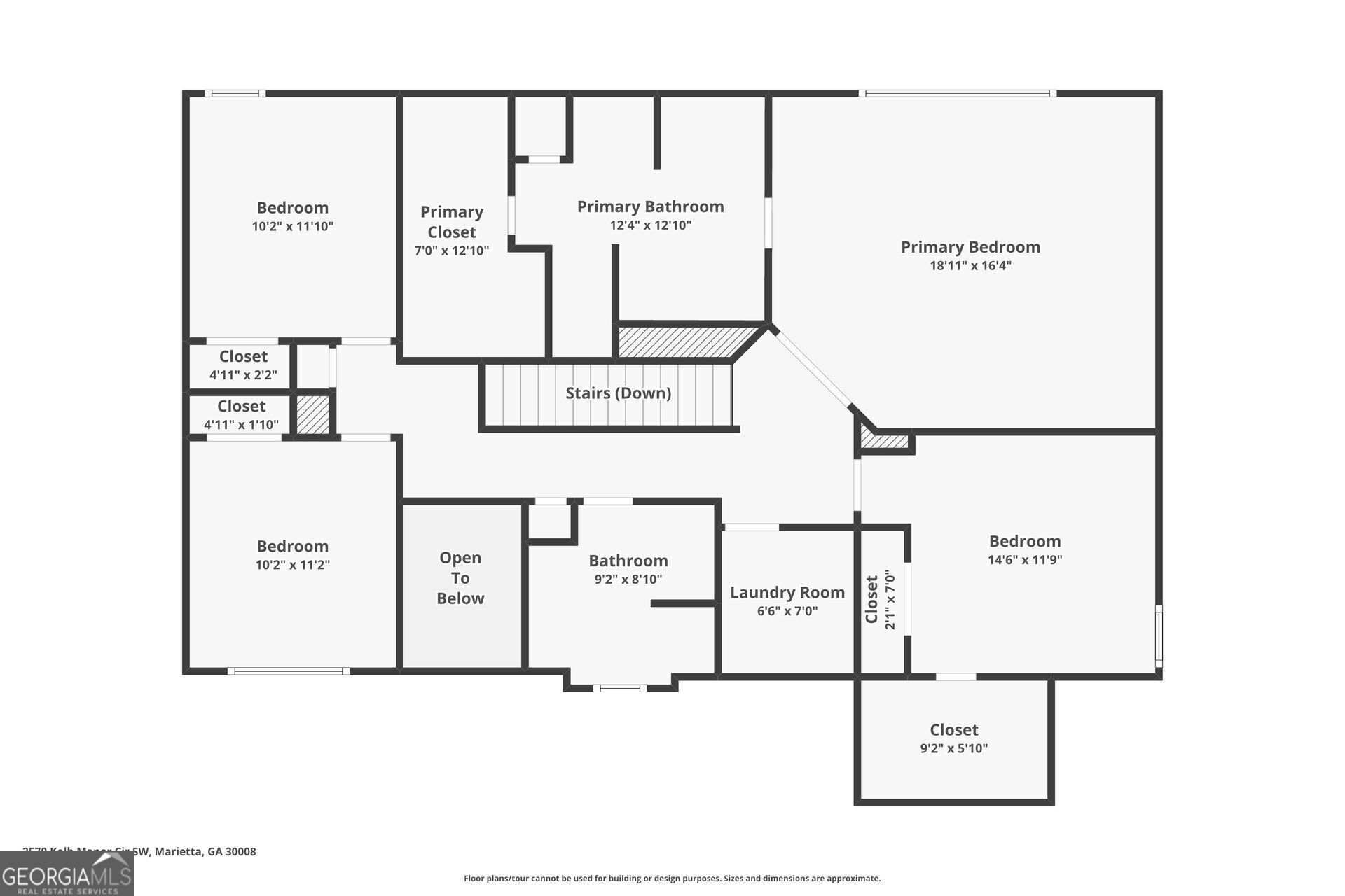 2570 Kolb Manor Circle Southwest Marietta, GA 30008 - Photo 21 of 22 a picture of a book and a bed