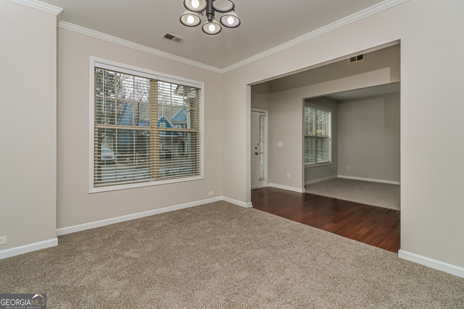 2570 Kolb Manor Circle Southwest Marietta, GA 30008 - Photo 8 of 22 a view of an empty room with a window