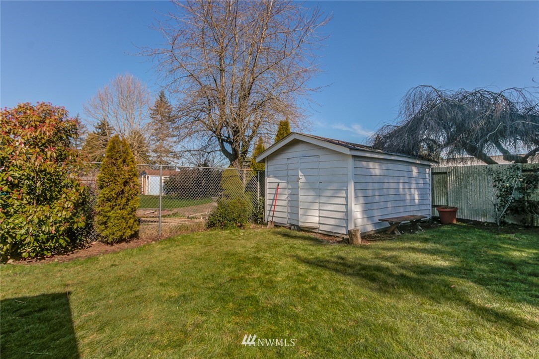 16618 124th Avenue Southeast Renton, WA 98058 - Photo 17 of 21 a view of a backyard of the house