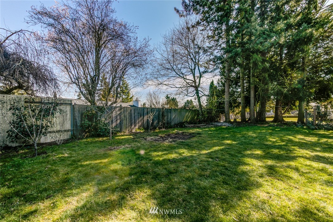 16618 124th Avenue Southeast Renton, WA 98058 - Photo 18 of 21 a view of backyard with green space