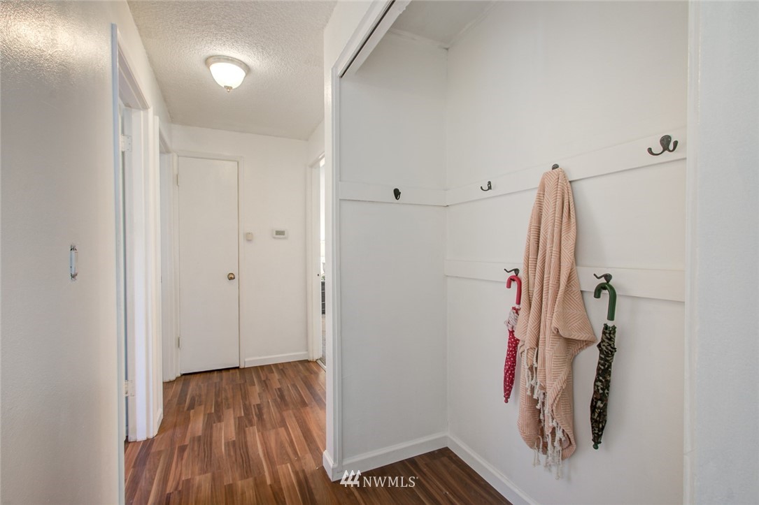16618 124th Avenue Southeast Renton, WA 98058 - Photo 9 of 21 a view of walk in closet with clothes and shoes