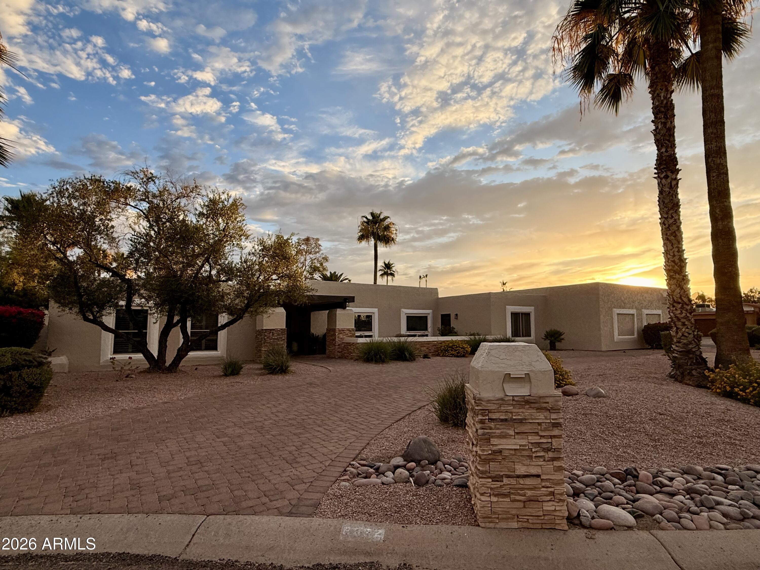 6932 East Presidio Road Scottsdale, AZ 85254 - Photo 30 of 30 a view of a yard with cars