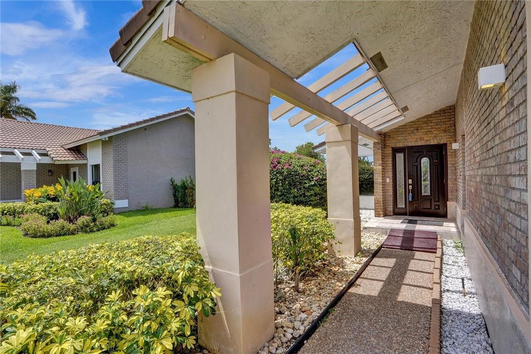10066 Camelback Lane Boca Raton, FL 33498 - Photo 29 of 34 a view of house with garden