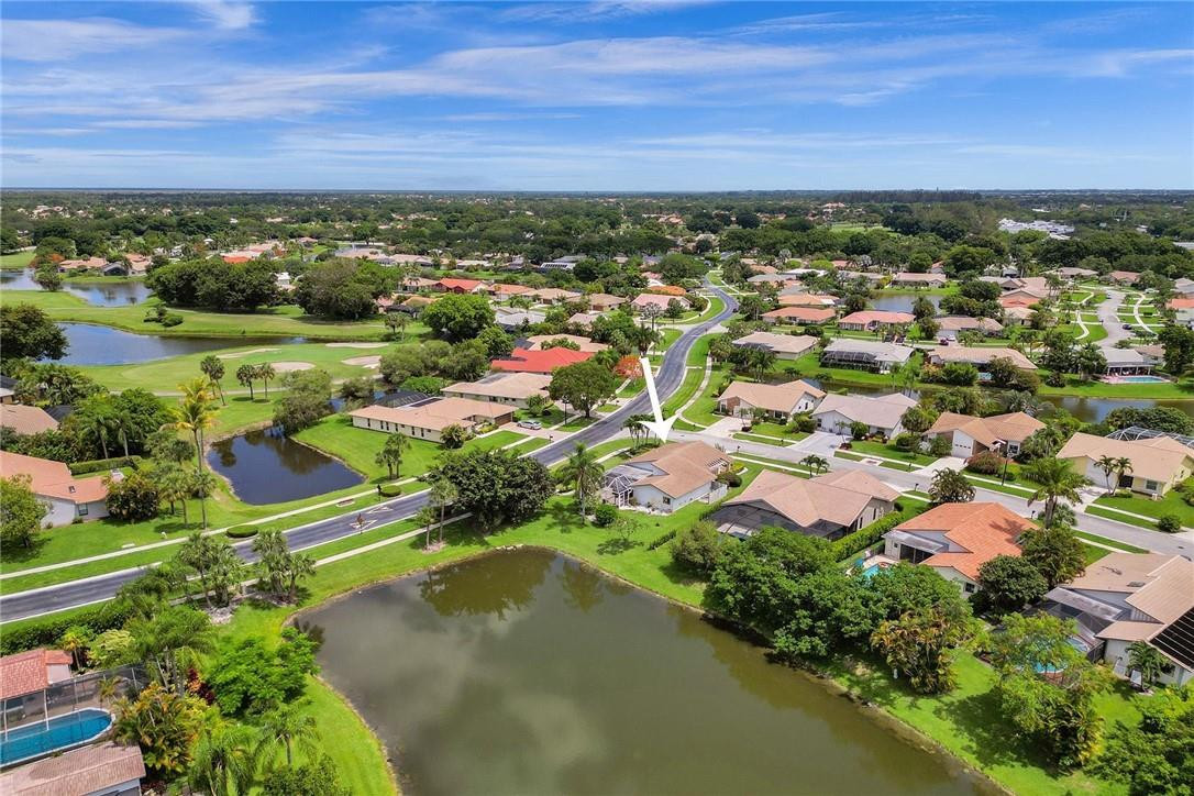 10066 Camelback Lane Boca Raton, FL 33498 - Photo 31 of 34 an aerial view of residential houses with outdoor space and trees
