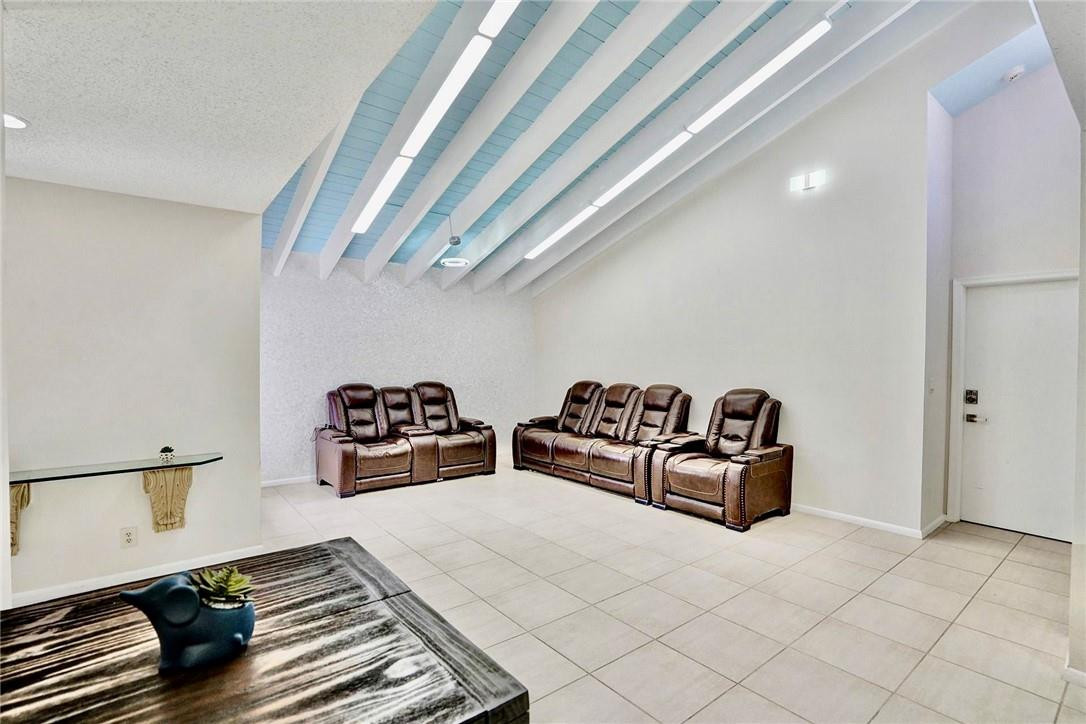 10066 Camelback Lane Boca Raton, FL 33498 - Photo 6 of 34 a bedroom with furniture and a rug