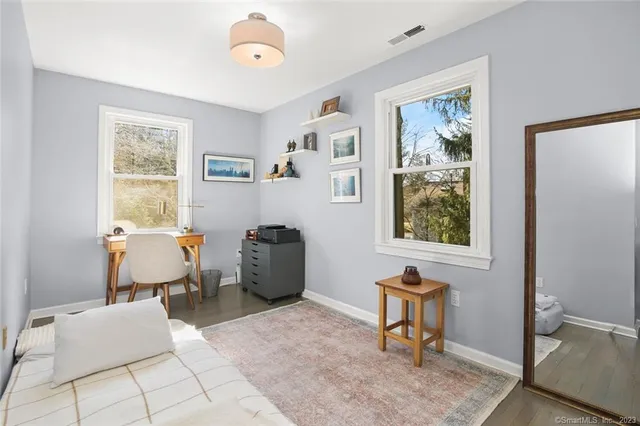 a view of a park with large trees