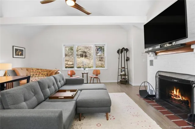 a view of a workspace with furniture and a couch