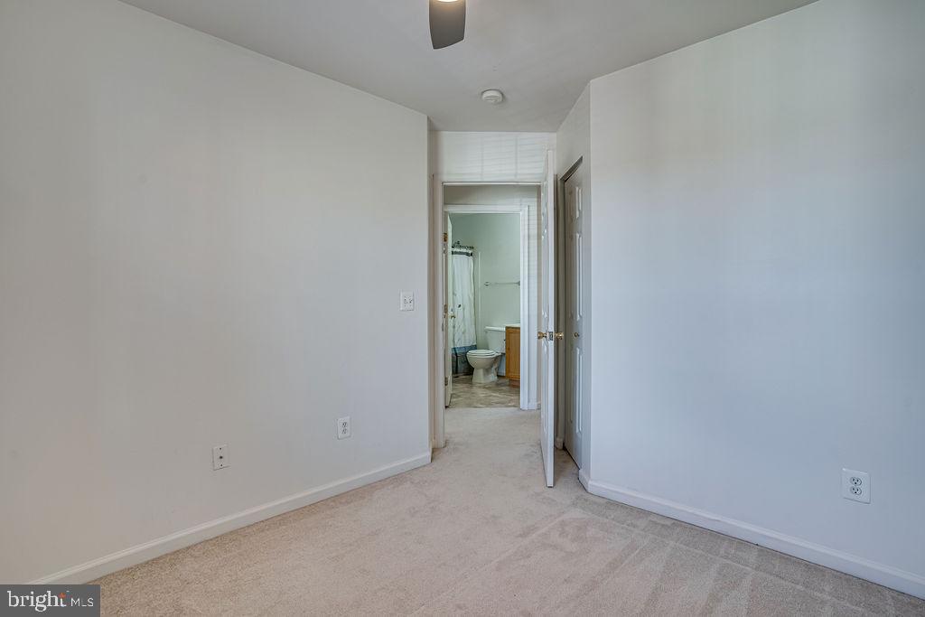 13262 Revillo Loop Woodbridge, VA 22191 - Photo 16 of 32 Bright and inviting hallway view.