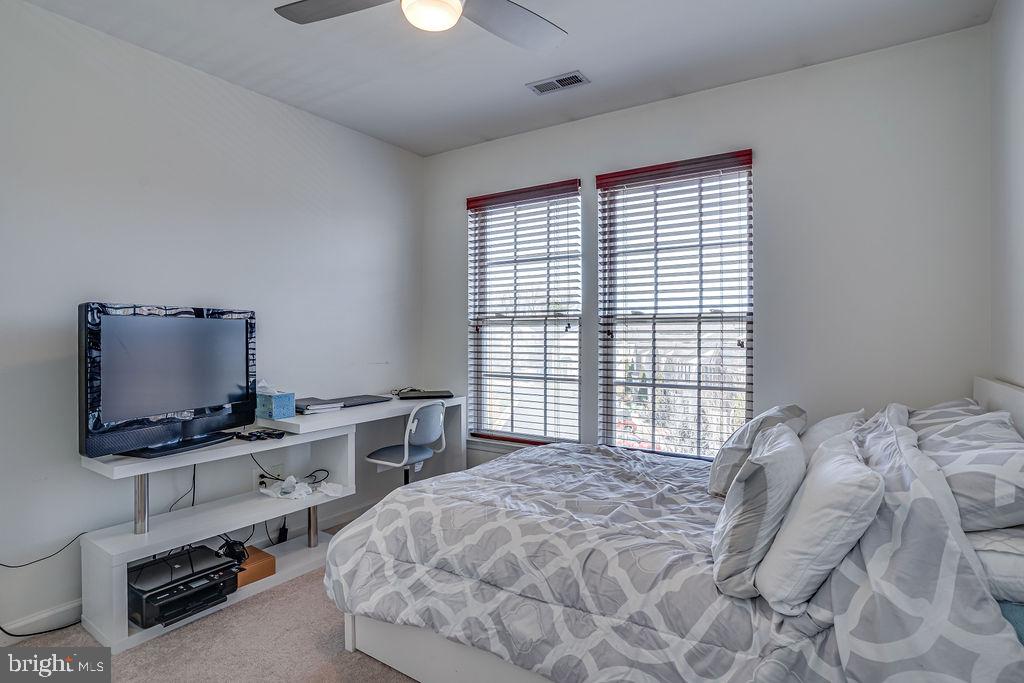 13262 Revillo Loop Woodbridge, VA 22191 - Photo 18 of 32 Bright and airy bedroom retreat.