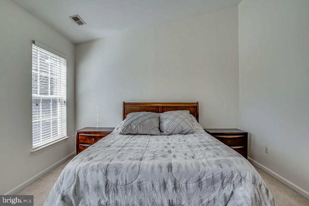 13262 Revillo Loop Woodbridge, VA 22191 - Photo 24 of 32 Bright and airy bedroom retreat.