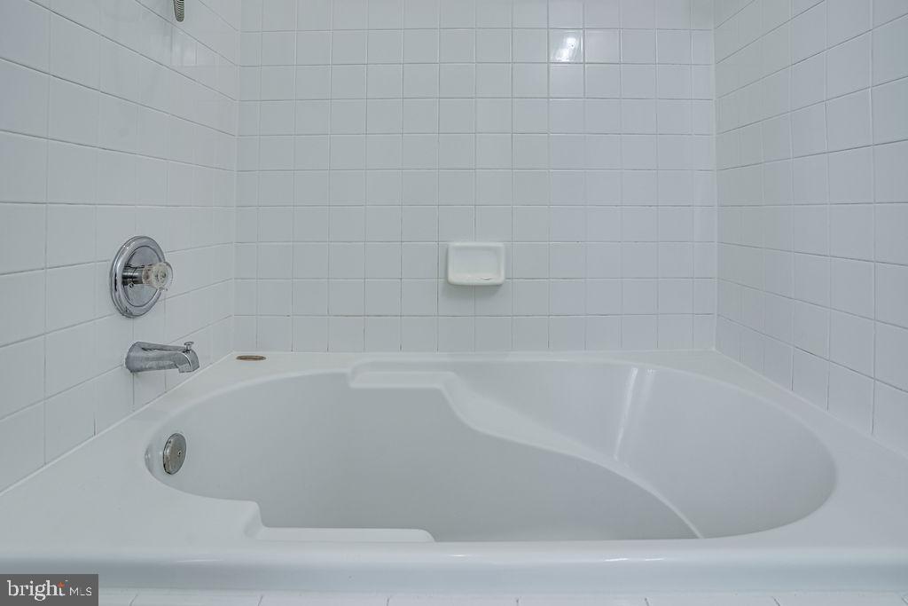 13262 Revillo Loop Woodbridge, VA 22191 - Photo 26 of 32 Serene white soaking tub retreat.