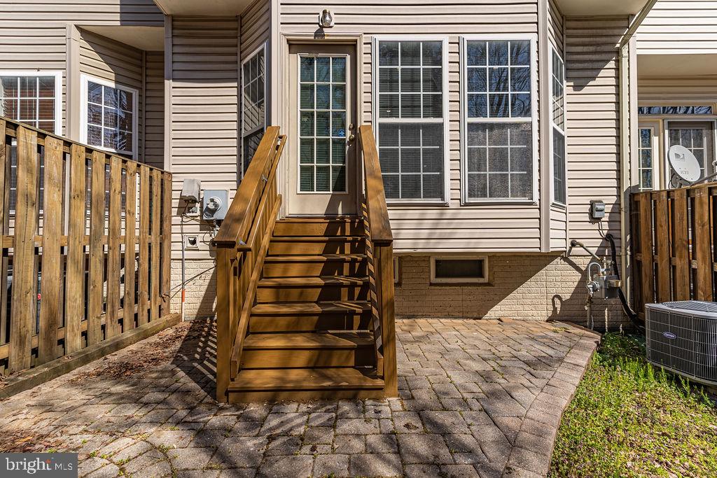 13262 Revillo Loop Woodbridge, VA 22191 - Photo 31 of 32 Inviting entrance with wooden steps.