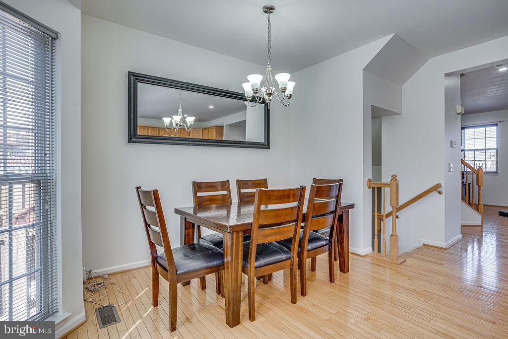 13262 Revillo Loop Woodbridge, VA 22191 - Photo 6 of 32 Bright dining space with modern charm.