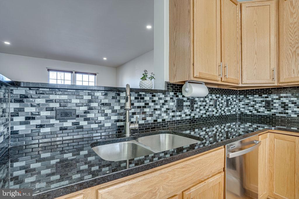 13262 Revillo Loop Woodbridge, VA 22191 - Photo 10 of 32 Sleek kitchen with modern finishes.