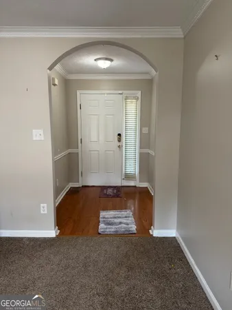 a view of an empty room and window