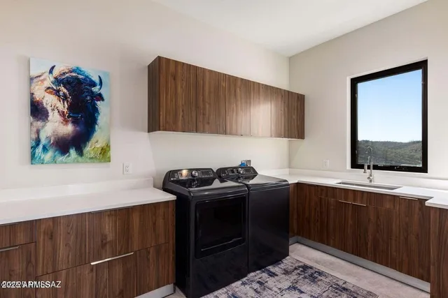 a view of a patio with table and chairs