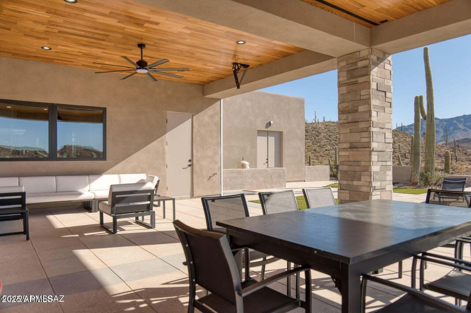 5901 West El Camino Del Cerro Tucson, AZ 85745 - Photo 39 of 50 a view of a dining room with furniture