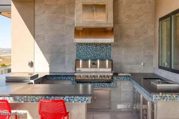 a view of a balcony with swimming pool