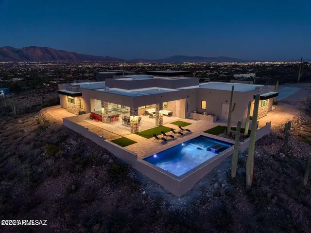 a view of a backyard with a tub