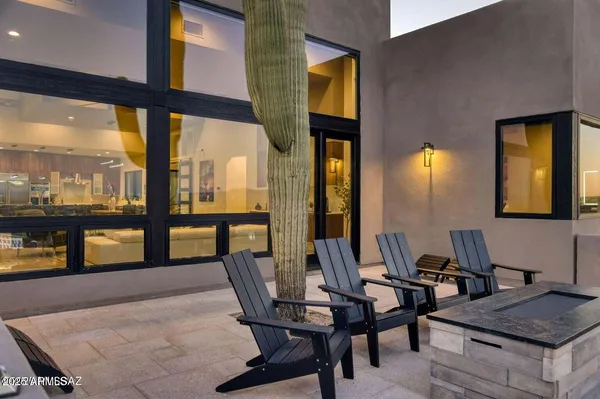 a view of a terrace with furniture
