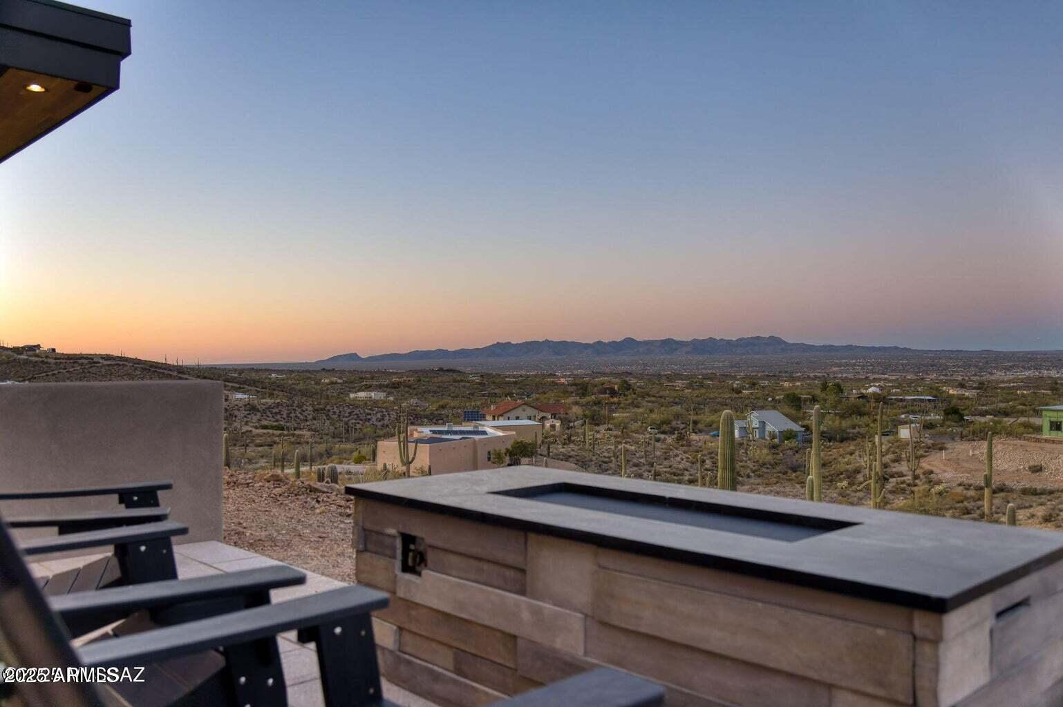 5901 West El Camino Del Cerro Tucson, AZ 85745 - Photo 45 of 50 a view of a terrace with furniture