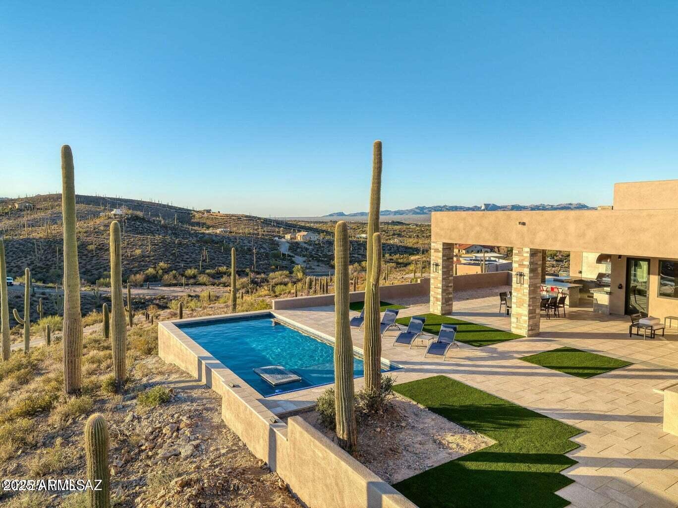 5901 West El Camino Del Cerro Tucson, AZ 85745 - Photo 47 of 50 a view of a terrace with chairs