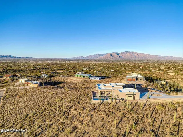 a view of a swimming pool with a lake view