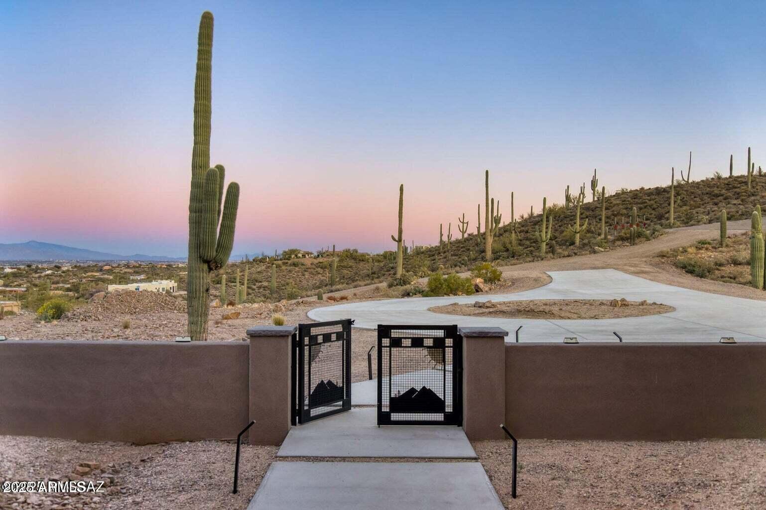 5901 West El Camino Del Cerro Tucson, AZ 85745 - Photo 10 of 50 a view of a terrace with sky view