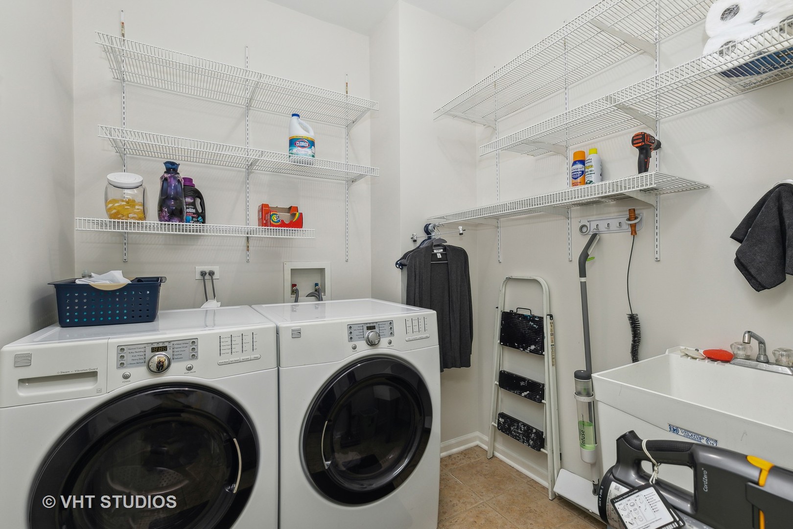 385 Sterling Circle Cary, IL 60013 - Photo 16 of 31 a utility room with dryer and washer