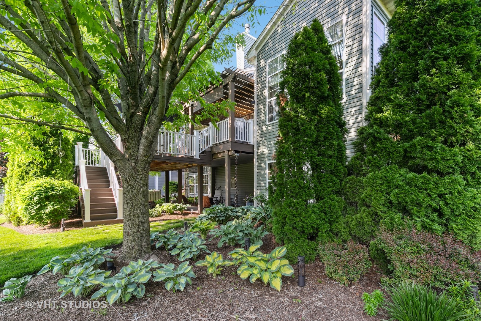 385 Sterling Circle Cary, IL 60013 - Photo 28 of 31 a front view of a house with garden