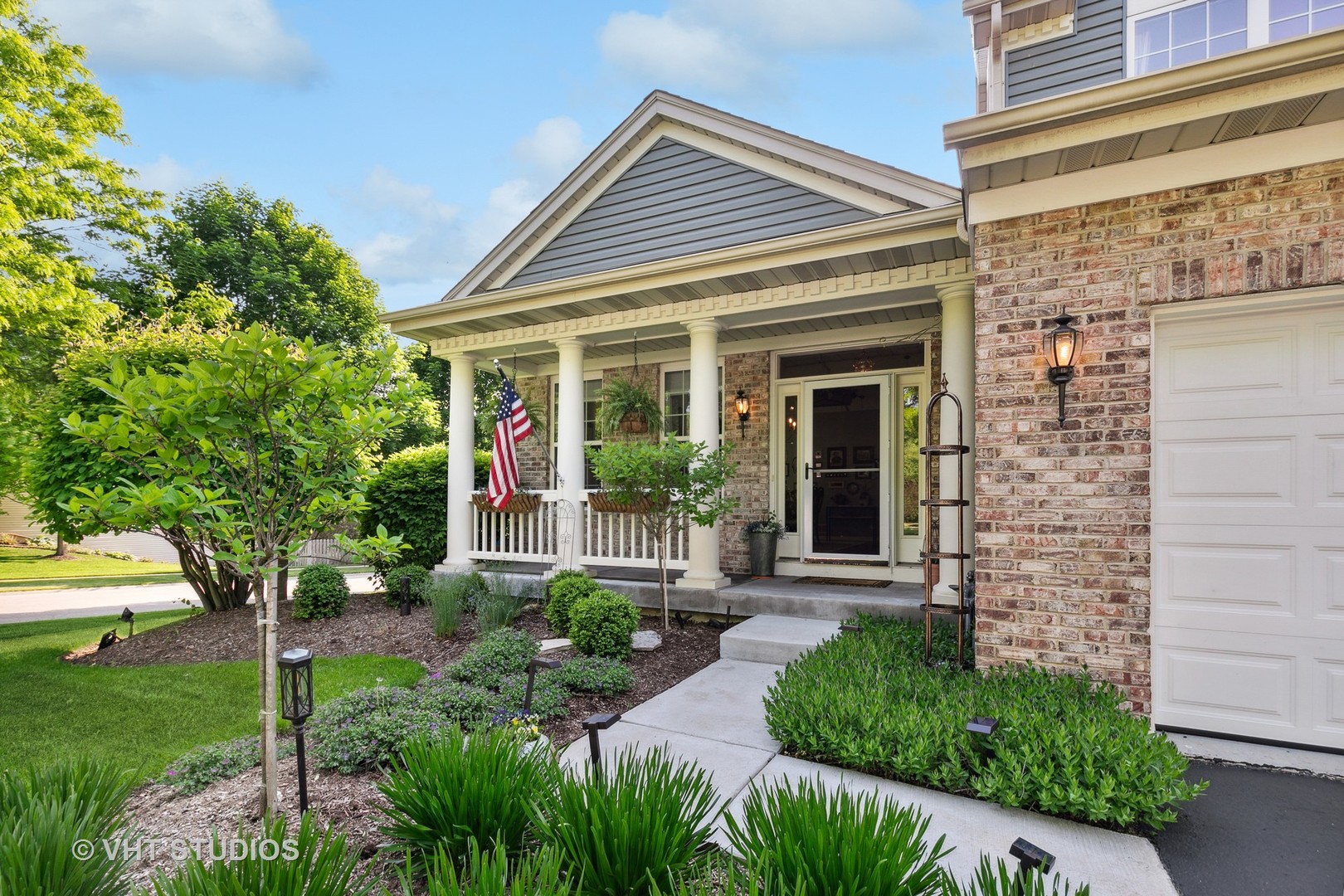 385 Sterling Circle Cary, IL 60013 - Photo 3 of 31 a front view of a house with garden