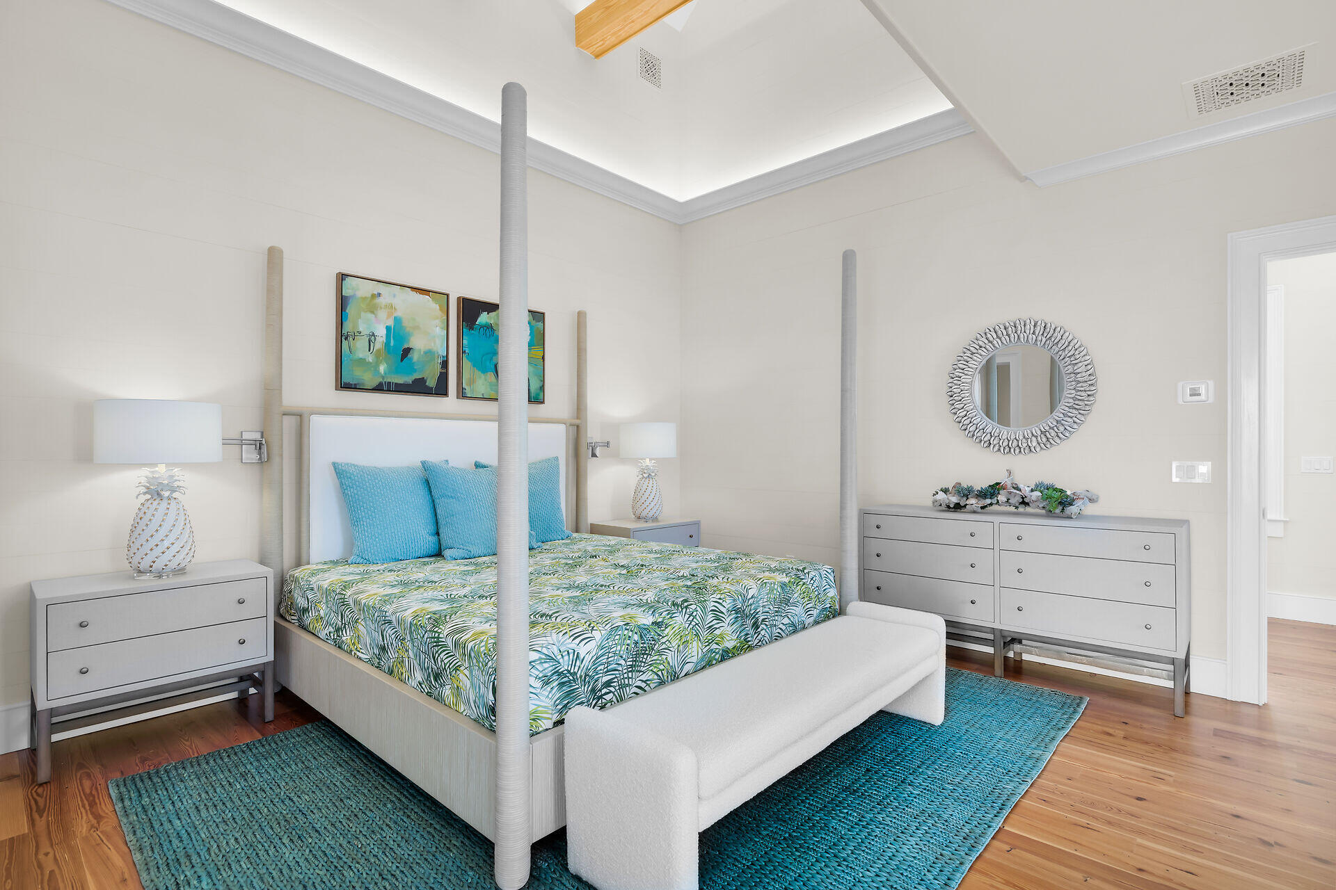 616 Eaton Street Key West, FL 33040 - Photo 17 of 62 a bedroom with a bed a mirror and lamp