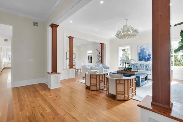 a view of a dining room with furniture window and wooden floor