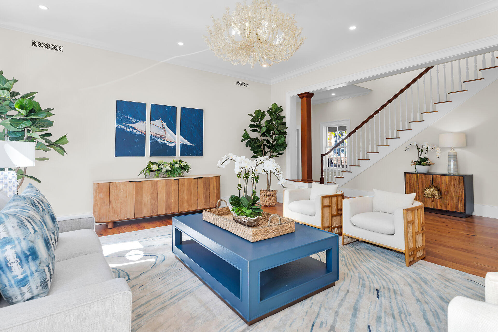 616 Eaton Street Key West, FL 33040 - Photo 3 of 62 a living room with furniture and a chandelier