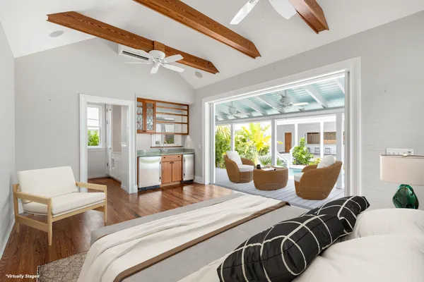 a bathroom with a double vanity sink window and a mirror