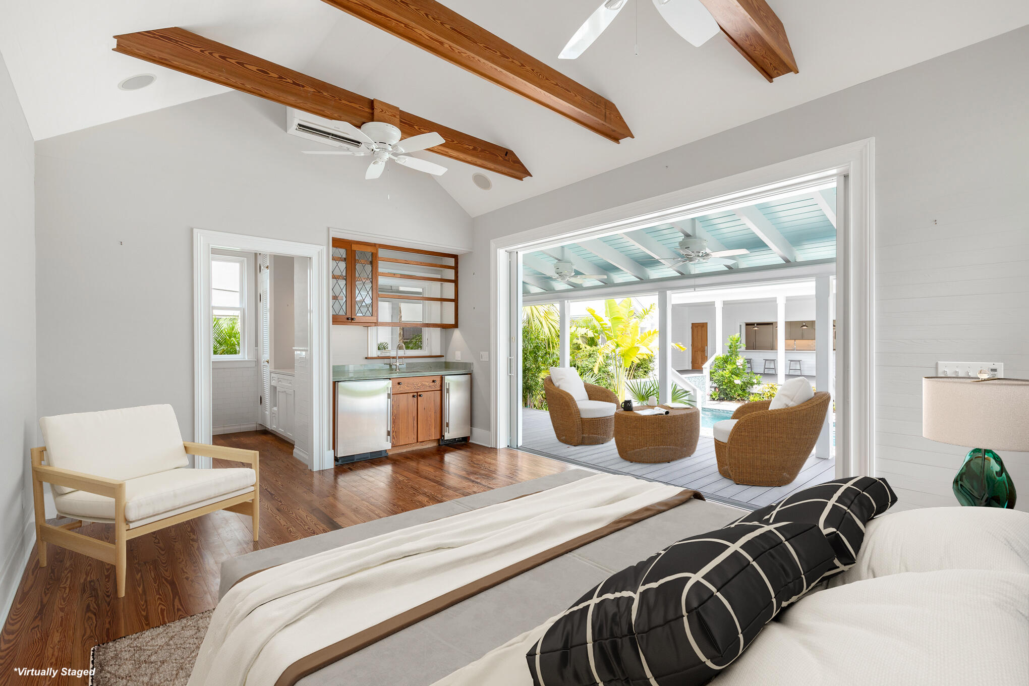 616 Eaton Street Key West, FL 33040 - Photo 34 of 62 a bedroom with furniture and a large window