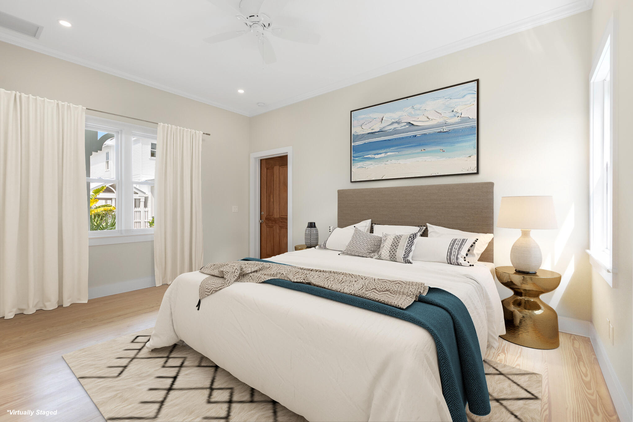 616 Eaton Street Key West, FL 33040 - Photo 42 of 62 a bedroom with a bed and a painting on the wall