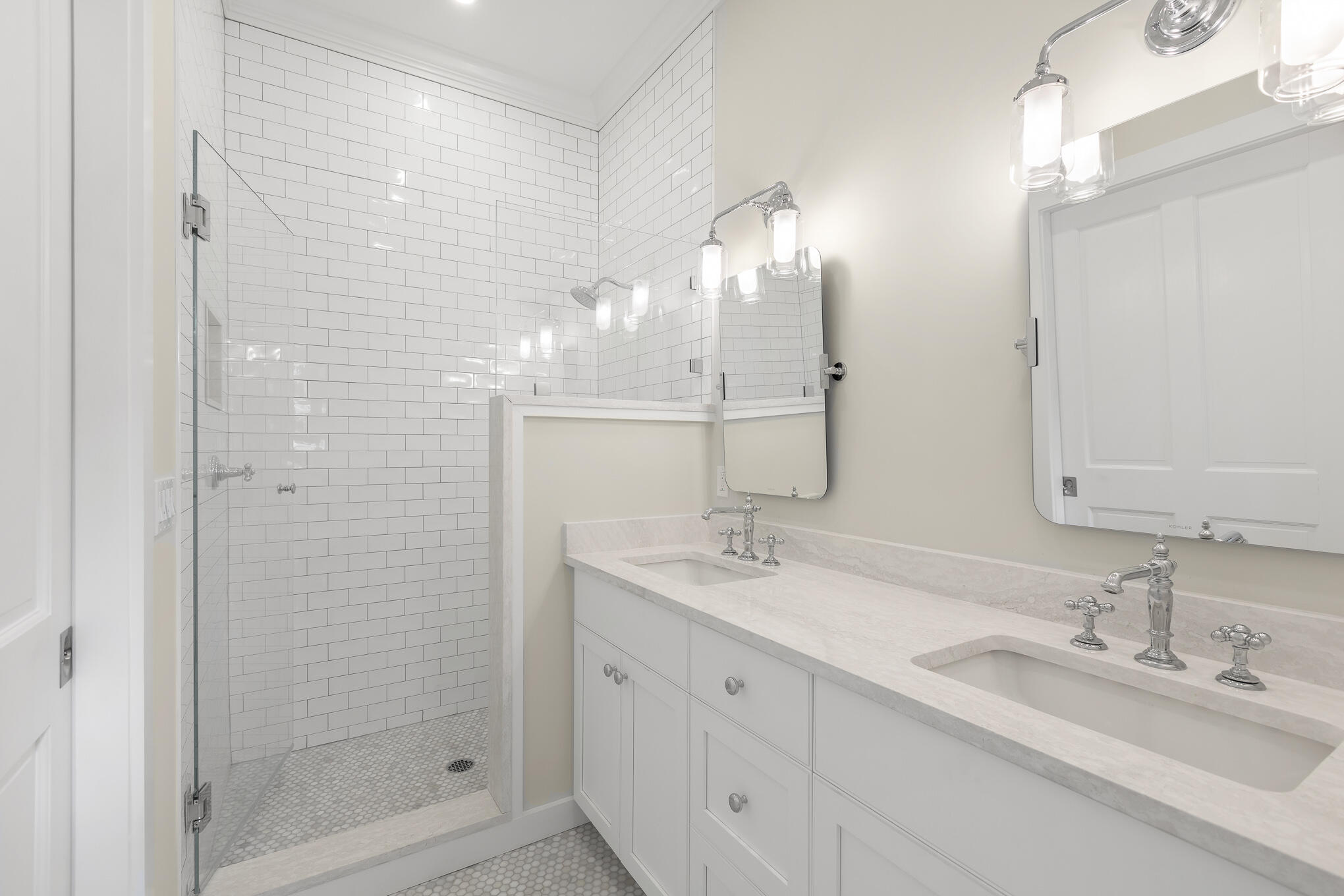 616 Eaton Street Key West, FL 33040 - Photo 47 of 62 a bathroom with a double vanity sink mirror and shower