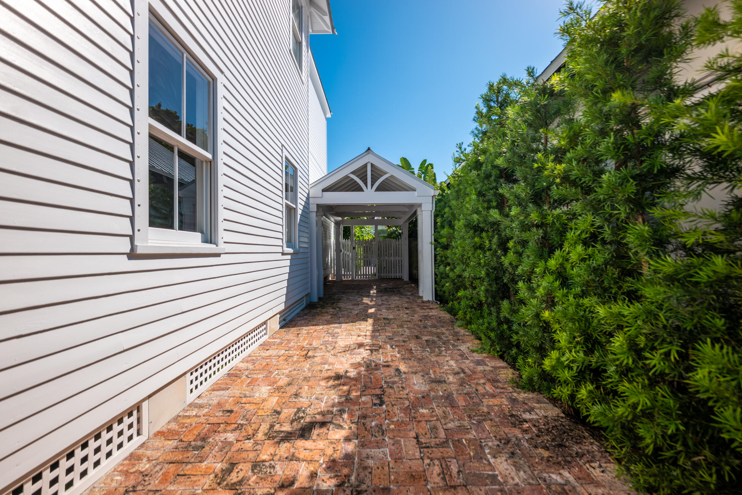 616 Eaton Street Key West, FL 33040 - Photo 51 of 62 a front view of a house with garden
