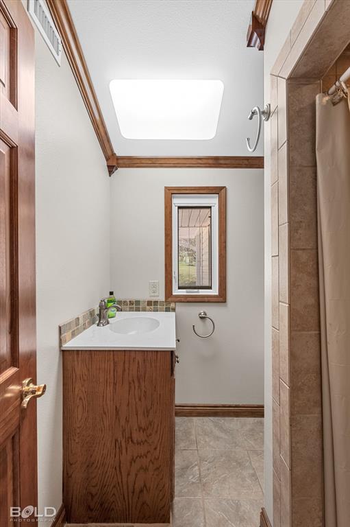 429 Robinson Lane Homer, LA 71040 - Photo 25 of 40 a room with a granite countertop sink and a mirror