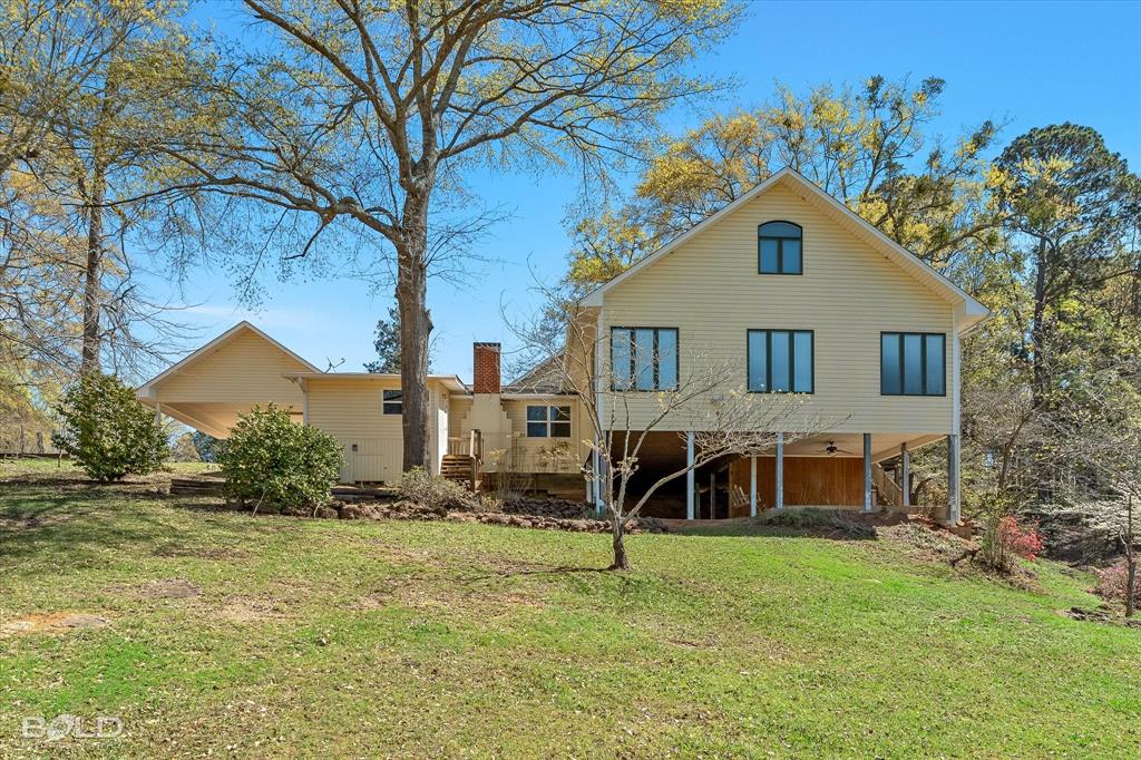429 Robinson Lane Homer, LA 71040 - Photo 3 of 40 a view of a house with a yard balcony and sitting area