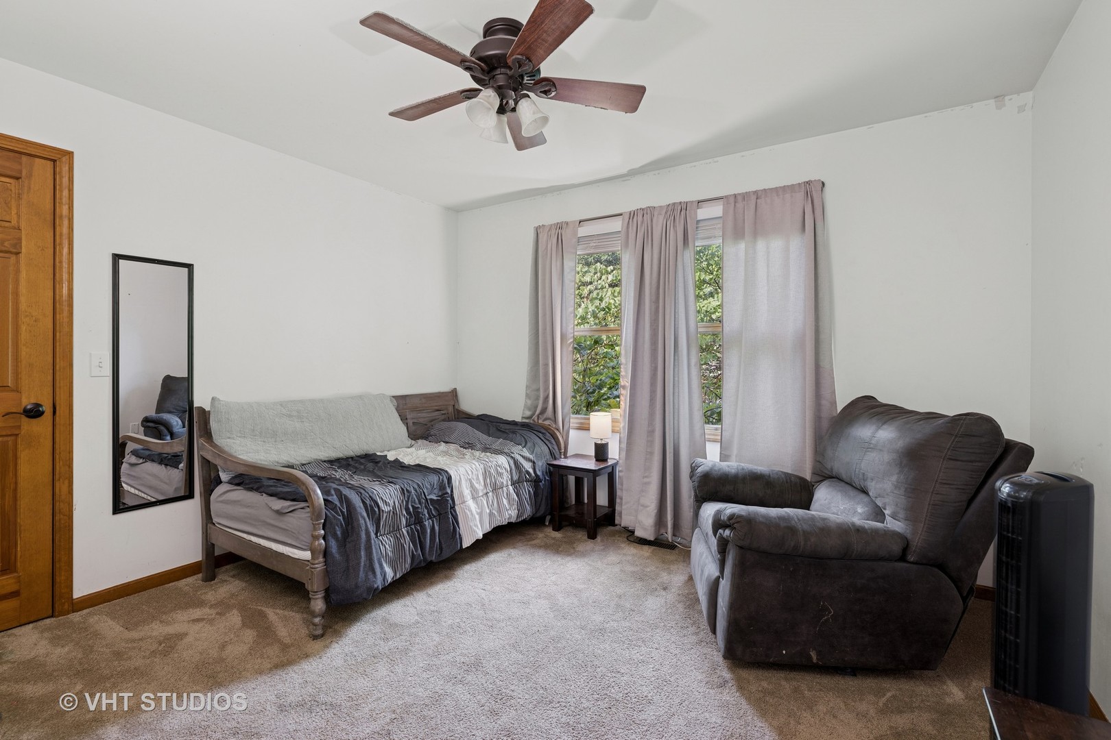 1177 Dovercliff Way Crystal Lake, IL 60014 - Photo 20 of 32 a bedroom with a bed and a couch