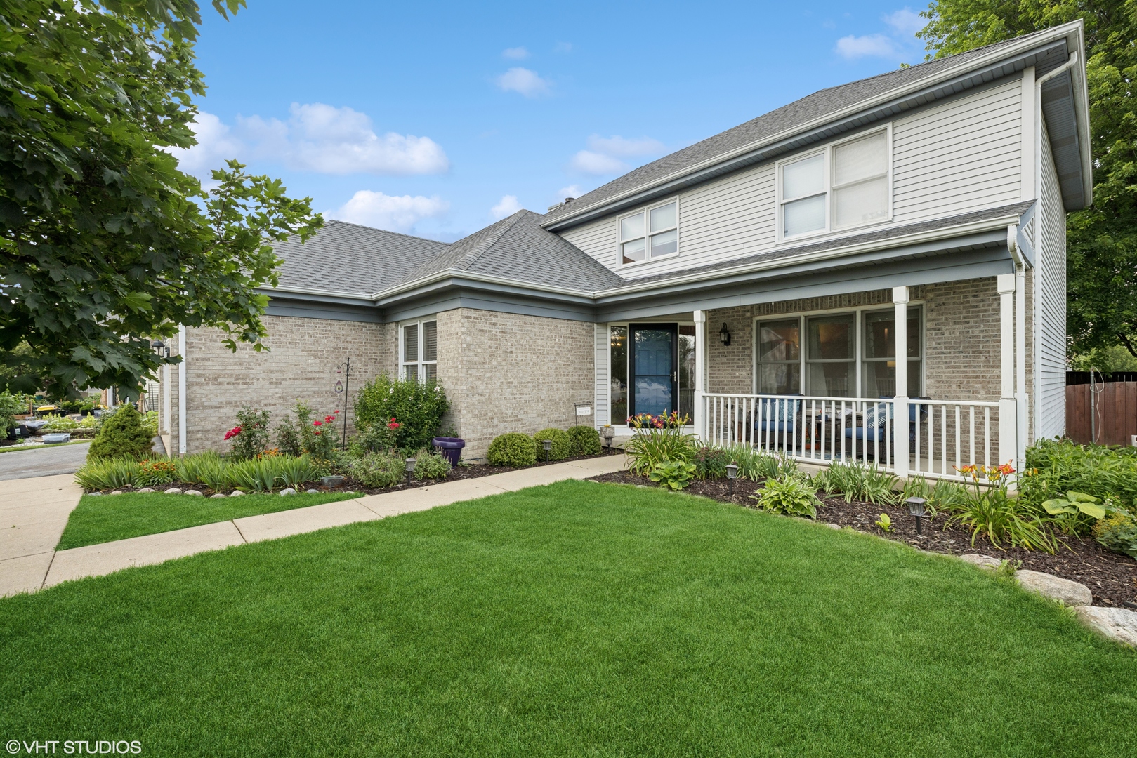 1177 Dovercliff Way Crystal Lake, IL 60014 - Photo 2 of 32 a view of a house with a yard and plants