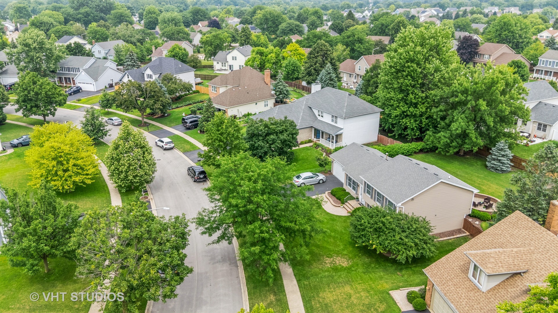 1177 Dovercliff Way Crystal Lake, IL 60014 - Photo 27 of 32 an aerial view of a house with outdoor space and lake view
