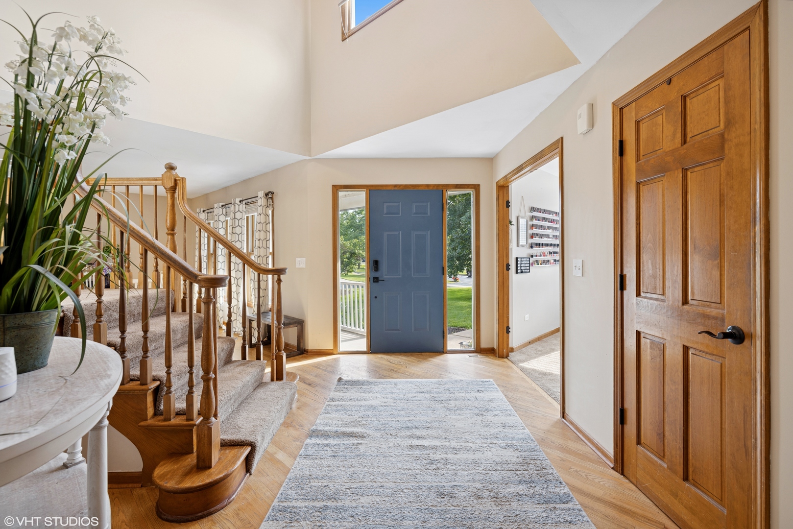 1177 Dovercliff Way Crystal Lake, IL 60014 - Photo 5 of 32 a view of entryway and hall with wooden floor