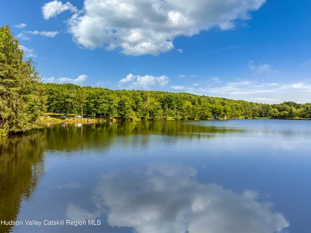 a view of a lake from a yard