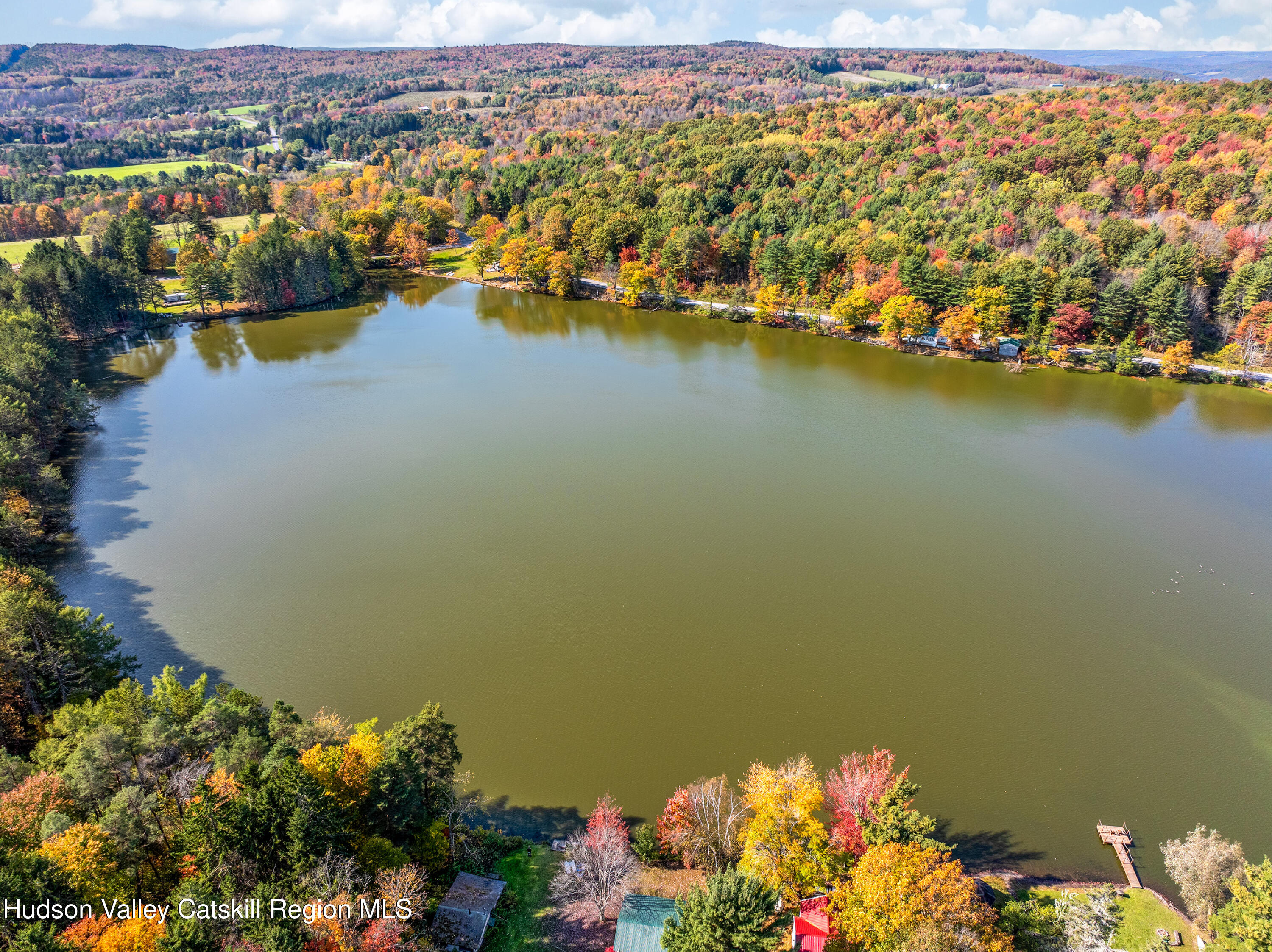 0 East Masonville Pond Road Sidney Center, NY 13839 - Photo 24 of 34 a view of a lake with boats and trees all around