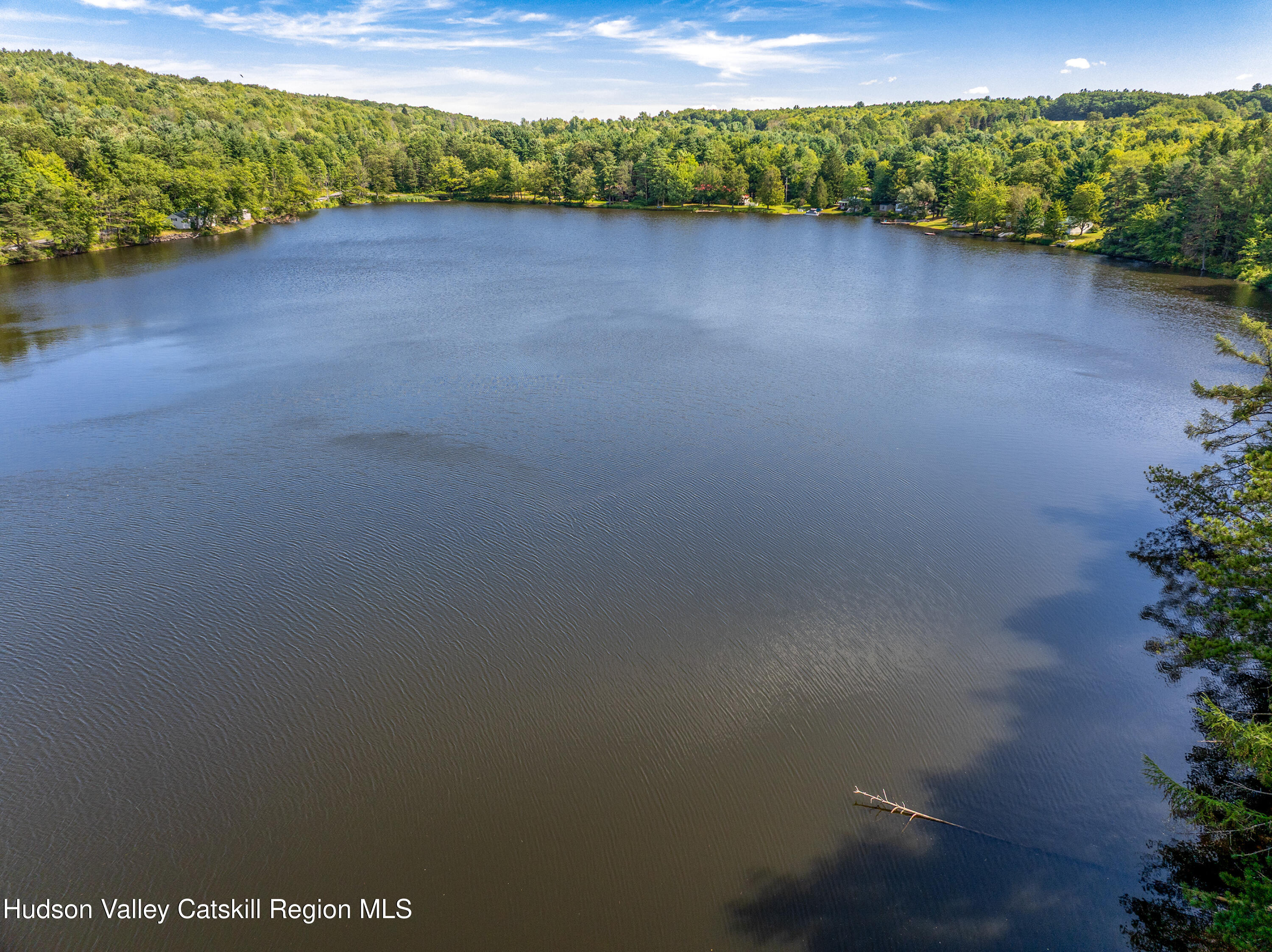 0 East Masonville Pond Road Sidney Center, NY 13839 - Photo 32 of 34 a view of a lake with a yard