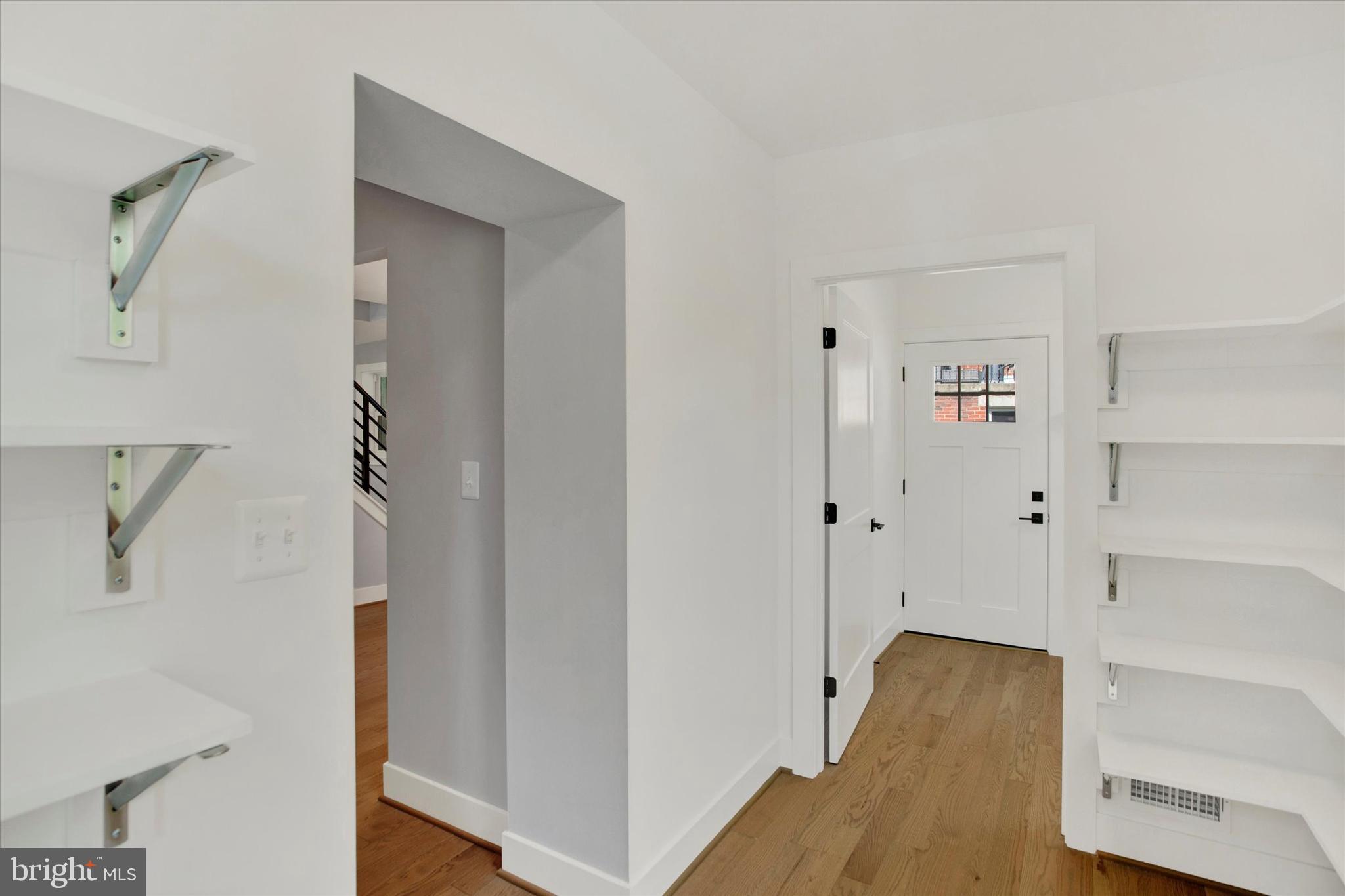 2054 34th Street Southeast Washington, DC 20020 - Photo 12 of 43 a view of hallway with wooden floor