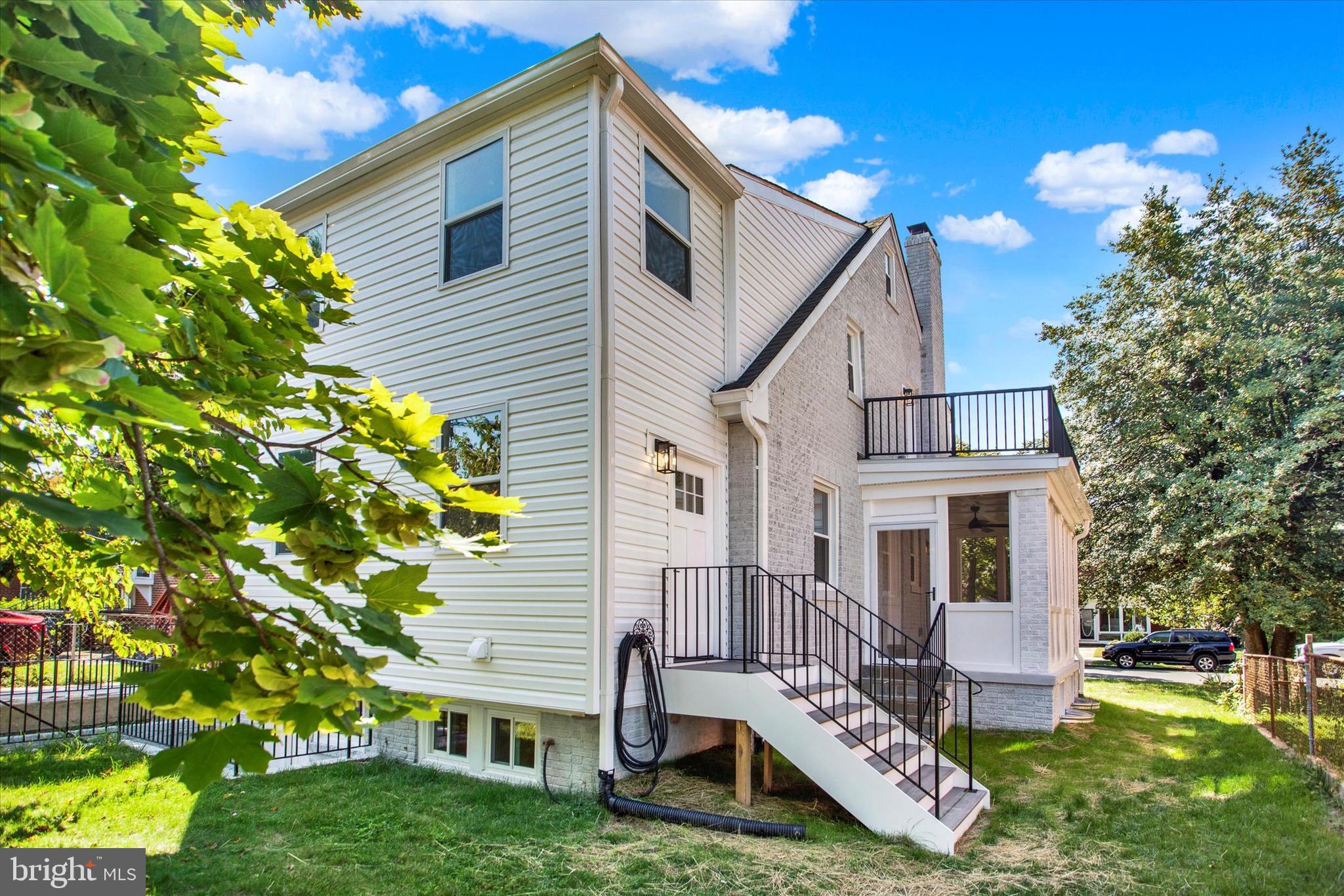 2054 34th Street Southeast Washington, DC 20020 - Photo 38 of 43 a front view of a house with garden